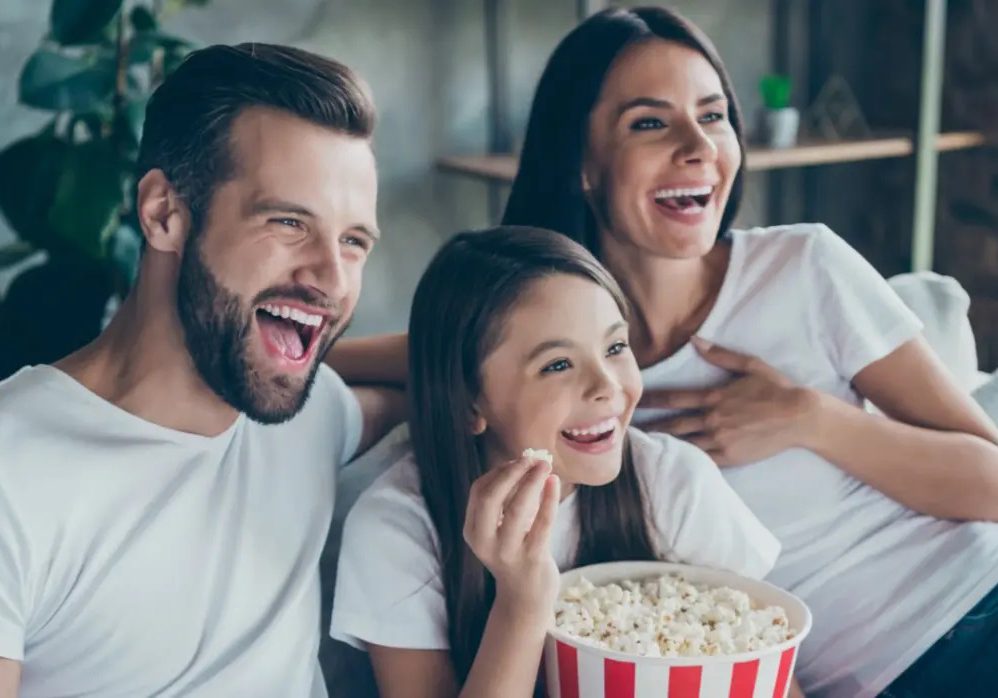 happy family watching tv