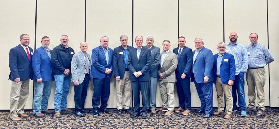From left are Judge-Executive J. Woods Adams III, Lincoln County; Mayor Todd DePriest of Jenkins; Judge-Executive Terry Adams, Letcher County; Judge-Executive Howell Holbrook Jr, Rockcastle County; State Rep. Tom O’Dell Smith; Cloyd Bumgardner, Pulaski County Judge/Administrative Assistant; Lonnie Lawson, President and CEO of The Center for Rural Development, Judge-Executive Harry Clark, Rowan County; Judge-Executive Mike Mitchell, Knox County; Brad Kilbey, CEO of Accelecom; State Sen. Robert Stivers; TJ Scott, Vice President of Operations, Broadlinc; Jeremy Holbrook, Boyd County Commissioner, and Judge-Executive Pat White Jr. of Whitley County.   